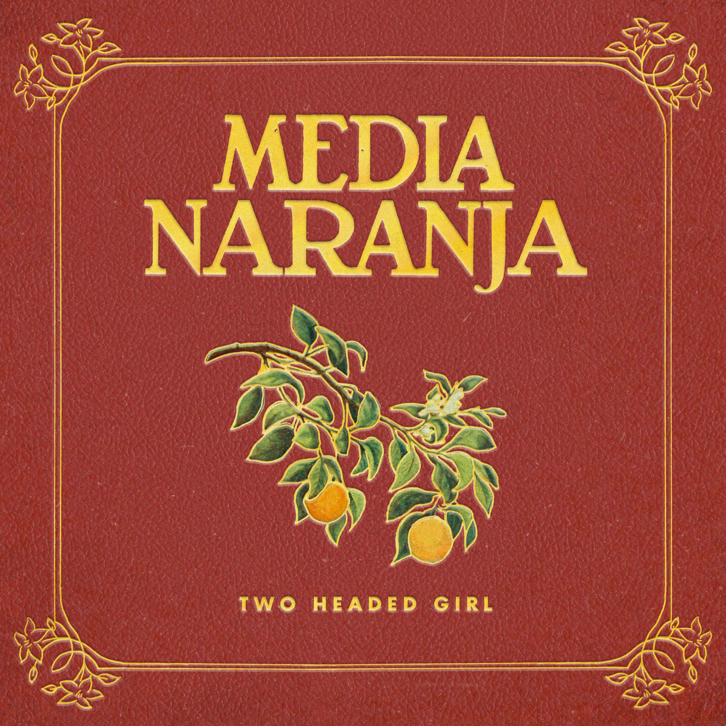 "Media Naranja" over a design of orange tree branches